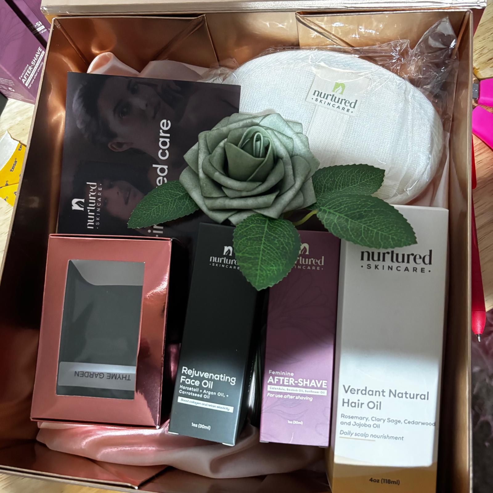 Nurtured Skincare gift box with skincare products and a rose